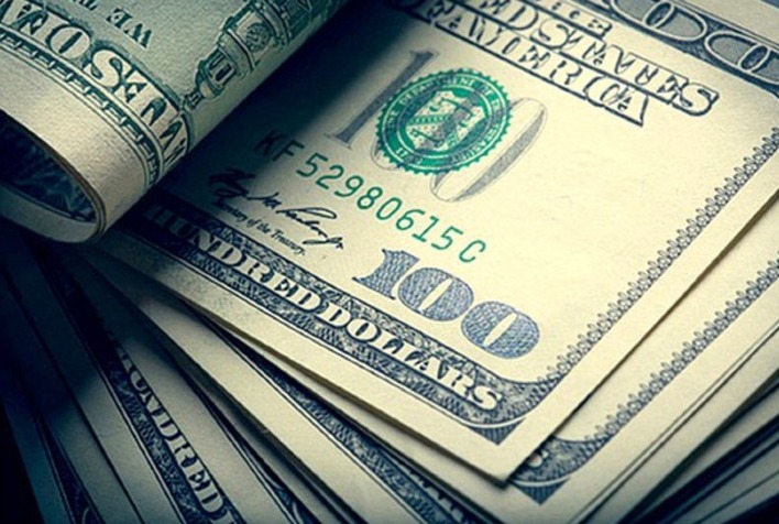 Dólar cai para R$ 5,12 enquanto mercado aguarda decisão do Fed e juros em alta